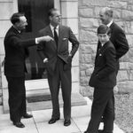 
              FILE - In this May 1, 1962 file photo, Britain's Prince Charles, tours his new school, Gordsonstoun, near Elgin, Scotland with his father, Prince Philip, as he arrives to start his first term. At left is house Master Robert Whitby, and Headmaster Mr. Robert Chew at right. Prince Charles has been preparing for the crown his entire life. Now, that moment has finally arrived. Charles, the oldest person to ever assume the British throne, became king on Thursday Sept. 8, 2022, following the death of his mother, Queen Elizabeth II.  (AP Photo/File)
            