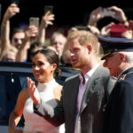 
              Britain's Prince Harry, 2nd right, and Meghan, Duchess of Sussex, arrive for a visit at the town hall in Duesseldorf, Germany, Tuesday, Sept. 6, 2022. Prince Harry visits the city as ambassador for the Invictus games, a week-long games for active servicemen and veterans who are ill, injured or wounded, hosted by Duesseldorf next year. (AP Photo/Martin Meissner)
            