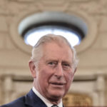 
              FILE - In this Wednesday, March 29, 2017 file photo, Britain's Prince Charles smiles during a welcoming ceremony at the Cotroceni Presidential Palace in Bucharest, Romania. Prince Charles has been preparing for the crown his entire life. Now, that moment has finally arrived. Charles, the oldest person to ever assume the British throne, became king on Thursday Sept. 8, 2022, following the death of his mother, Queen Elizabeth II.  (AP Photo/Vadim Ghirda, File)
            