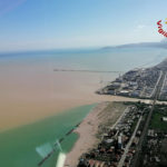 
              This picture released by the Italian firefighters shows an aerial view of the Senigallia coast after floods hit Marche region, central-east Italy, Friday, Sept. 16, 2022. Floodwaters triggered by heavy rainfall swept through several towns in the hilly region of Marche, central-east Italy early Friday, leaving 10 people dead and several missing, state radio said. Dozens of survivors scrambled onto rooftops or up trees to await rescue. (Italian Firefighters - Vigili del Fuoco via AP)
            