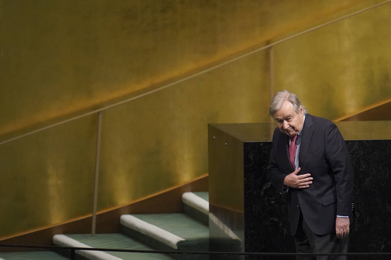 United Nations Secretary-General Antonio Guterres acknowledges the delegates applause as he leaves ...