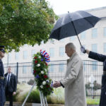 
              President Joe Biden participates in a wreath laying ceremony while visiting the Pentagon in Washington, Sunday, Sept. 11, 2022, to honor and remember the victims of the September 11th terror attack. (AP Photo/Susan Walsh)
            