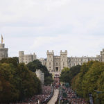 
              The coffin of Queen Elizabeth II is carried in a hearse  towards Windsor Castle during her funeral procession in Windsor, England, Monday, Sept. 19, 2022. (Alex Pantling/Pool photo via AP)
            