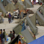 
              Temporary tent housing for flood victims is organized by the Chinese government, in Sukkur, Pakistan, Wednesday, Sept. 7, 2022. (AP Photo/Fareed Khan)
            