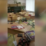 
              In this handout image taken from video released by the Russian Investigative Committee, ammunition are seen on a table in a classroom at the scene of a shooting at school No. 88 in Izhevsk, Russia, Monday, Sept. 26, 2022. A gunman on Monday morning killed several people and wounded others in a school in central Russia, authorities said. (Russian Investigative Committee via AP)
            