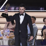 
              Brett Goldstein accepts the Emmy for outstanding supporting actor in a comedy series for "Ted Lasso" at the 74th Primetime Emmy Awards on Monday, Sept. 12, 2022, at the Microsoft Theater in Los Angeles. (AP Photo/Mark Terrill)
            