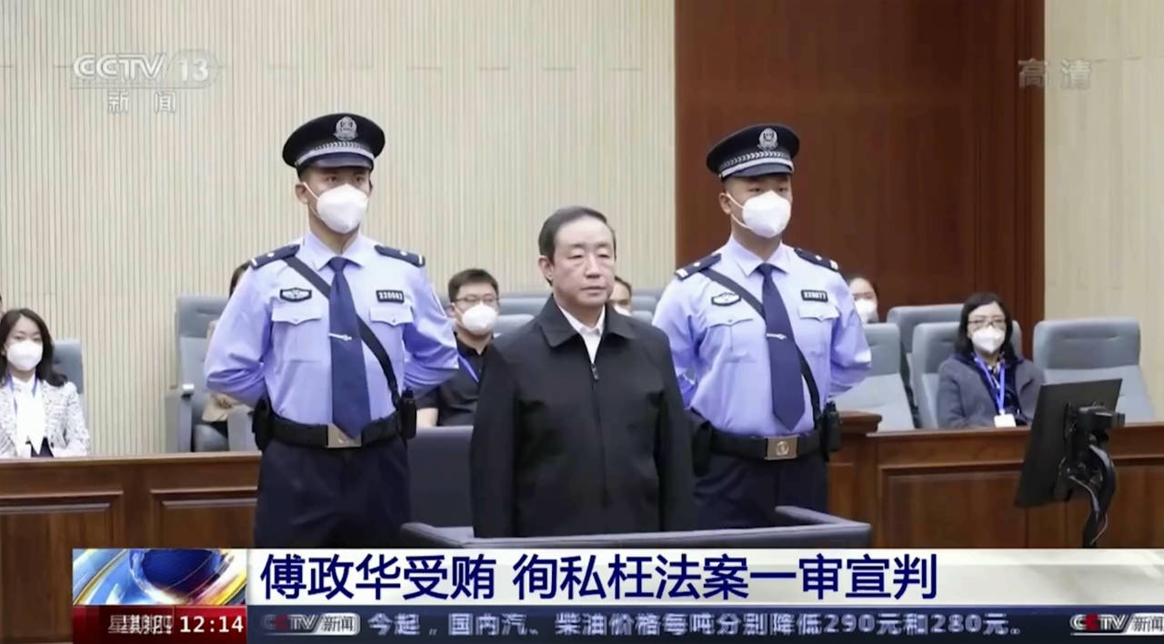 In this image taken from video footage run by China's CCTV, former Chinese justice minister Fu Zhen...