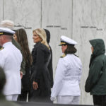 
              First lady Jill Biden participates in a wreath laying at the Flight 93 National Memorial Wall of Names following a ceremony commemorating the 21st anniversary of the Sept. 11, 2001 terrorist attacks in Shanksville, Pa., Sunday, Sept. 11, 2022. (AP Photo/Barry Reeger)
            