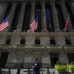 
              A trader looks over his cell phone outside the New York Stock Exchange, Wednesday, Sept. 14, 2022, in the financial district of Manhattan in New York.  Stocks edged higher in afternoon trading on Wall Street Wednesday following the market's worst day in two years on fears about higher interest rates and the recession they could create.  (AP Photo/Mary Altaffer)
            