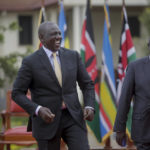
              Kenya's President-Elect William Ruto, left, jokes with Deputy President-Elect Rigathi Gachagua, right, as he addresses the media at his official residence in Nairobi, Kenya Monday, Sept. 5, 2022. Kenya's Supreme Court on Monday unanimously rejected challenges to the official results of the presidential election and upheld William Ruto's narrow win in East Africa's most stable democracy. (AP Photo/Brian Inganga)
            