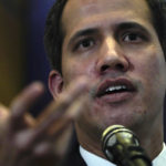 
              Opposition leader Juan Guaido explains the income and expenses of his self-proclaimed, parallel government in Caracas, Venezuela, Friday, Sept. 16, 2022. The U.S. and other nations recognized Guaido as Venezuela’s interim president when they withdrew recognition of President Nicolas Maduro after accusing him of rigging his 2018 re-election as president. (AP Photo/Ariana Cubillos)
            