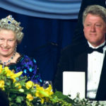 
              FILE - Queen Elizabeth smiles as she sits alongside U.S. President Bill Clinton at a dinner in the Guildhall in Portsmouth, England, commemorating the 50th anniversary of D-Day, June 4, 1994. Queen Elizabeth II, Britain's longest-reigning monarch and a rock of stability across much of a turbulent century, died Thursday, Sept. 8, 2022, after 70 years on the throne. She was 96. (AP Photo/Doug Mills, File)
            