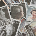 
              Newspapers devoted to the death of Queen Elizabeth II are seen in Manchester, England, Friday, Sept. 9, 2022. Queen Elizabeth II, Britain's longest-reigning monarch, died on Thursday Sept. 8 aged 96. (AP Photo/Jon Super)
            
