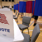 
              Voters cast their ballots, Tuesday, Sept. 13, 2022, at a polling station in Derry, N.H. (AP Photo/Charles Krupa)
            