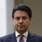 
              FILE - In this Jan. 23, 2020 file photo, Italian premier Giuseppe Conte waits for Albania's Prime Minister Edi Rama at Palazzo Chigi Government's office, in Rome. A lawyer specializing in mediation, Conte, now 58, was plucked out of political obscurity to become premier in 2018 after the populist, euro-skeptic 5-Star Movement he now heads stunned Italy’s establishment by sweeping nearly 33% of the vote to become Parliament's largest party. As a premier Conte enforced one of the world’s strictest coronavirus lockdowns. Italy will elect a new Parliament on Sept. 25. (AP Photo/Alessandra Tarantino, file)
            