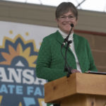 
              Gov. Laura Kelly smiles as supporters chant her name before the start of a gubernatorial debate against Attorney General Derek Schmidt at the Kansas State Fair in Hutchinson, Kan., on Saturday, Sept. 10, 2022. (Evert Nelson/The Topeka Capital-Journal via AP)
            