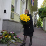 
              Former Ukrainian Prime Minister Yulia Tymoshenko lays flowers in remembrance of Queen Elizabeth II, at the British Embassy, in Kyiv, Ukraine, Friday, Sept. 9, 2022. Queen Elizabeth II, Britain's longest-reigning monarch and a rock of stability across much of a turbulent century, died Thursday after 70 years on the throne. She was 96. (AP Photo/Efrem Lukatsky)
            