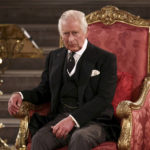 
              Britain's King Charles III sits at Westminster Hall, where both Houses of Parliament are meeting to express their condolences following the death of Queen Elizabeth II, at Westminster Hall, in London, Monday, Sept. 12, 2022. Queen Elizabeth II, Britain's longest-reigning monarch, died Thursday after 70 years on the throne. (Henry Nicholls/Pool Photo via AP)
            