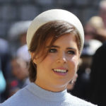 
              FILE - Britain's Princess Eugenie arrives for the wedding ceremony of Prince Harry and Meghan Markle at St. George's Chapel in Windsor Castle in Windsor, near London, England. Saturday, May 19, 2018. (Gareth Fuller/pool photo via AP, File)
            