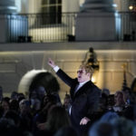 
              Elton John performs on the South Lawn of the White House in Washington, Friday, Sept. 23, 2022. John is calling the show "A Night When Hope and History Rhyme," a reference to a poem by Irishman Seamus Heaney that President Joe Biden often quotes. (AP Photo/Susan Walsh)
            
