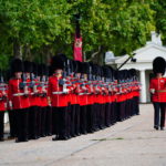
              Members of the Coldstream  Guards leave Wellington Barracks ahead of the ceremonial procession of the coffin of Queen Elizabeth II from Buckingham Palace to Westminster Hall, in central London, Wednesday, Sept. 14, 2022. (Ben Birchall/Pool via AP)
            