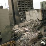 
              FILE - A view of the United States Embassy, left, and other damaged buildings in downtown Nairobi, Kenya on Aug. 8, 1998 the day after terrorist bombs in Kenya and Dar es Salaam, Tanzania. Caulkin, a retired Associated Press photographer who captured the iconic moment when ice dancers Jayne Torvill and Christopher Dean won the 1984 Olympic gold medal, has died. He was 77 and suffered from cancer. (AP Photo/Dave Caulkin, File)
            