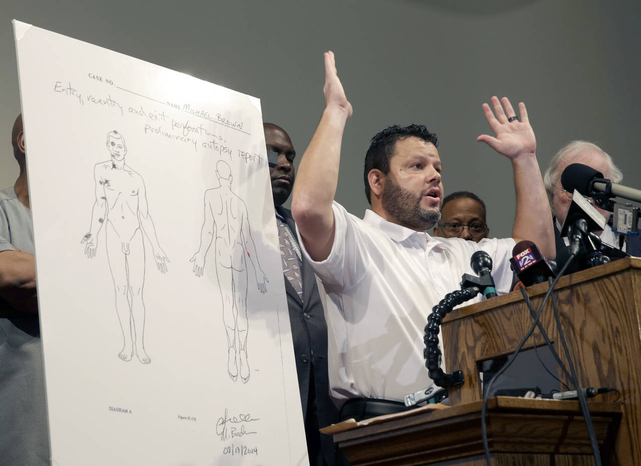 FILE - Shawn Parcells speaks during a news conference in St. Louis County, Mo., on Aug. 18, 2014. P...