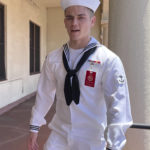 
              US Navy sailor Ryan Sawyer Mays walks past reporters at Naval Base San Diego before entering a Navy courtroom Wednesday, Aug. 17, 2022, in San Diego. Mays is accused of setting the USS Bonhomme Richard on fire, and his court martial is scheduled to begin Monday, Sept. 19, 2022. The July 2020 blaze damaged the billion-dollar warship so badly it had to be scuttled and marked one of the worst noncombat US warship disasters in recent memory. (AP Photo/Julie Watson)
            