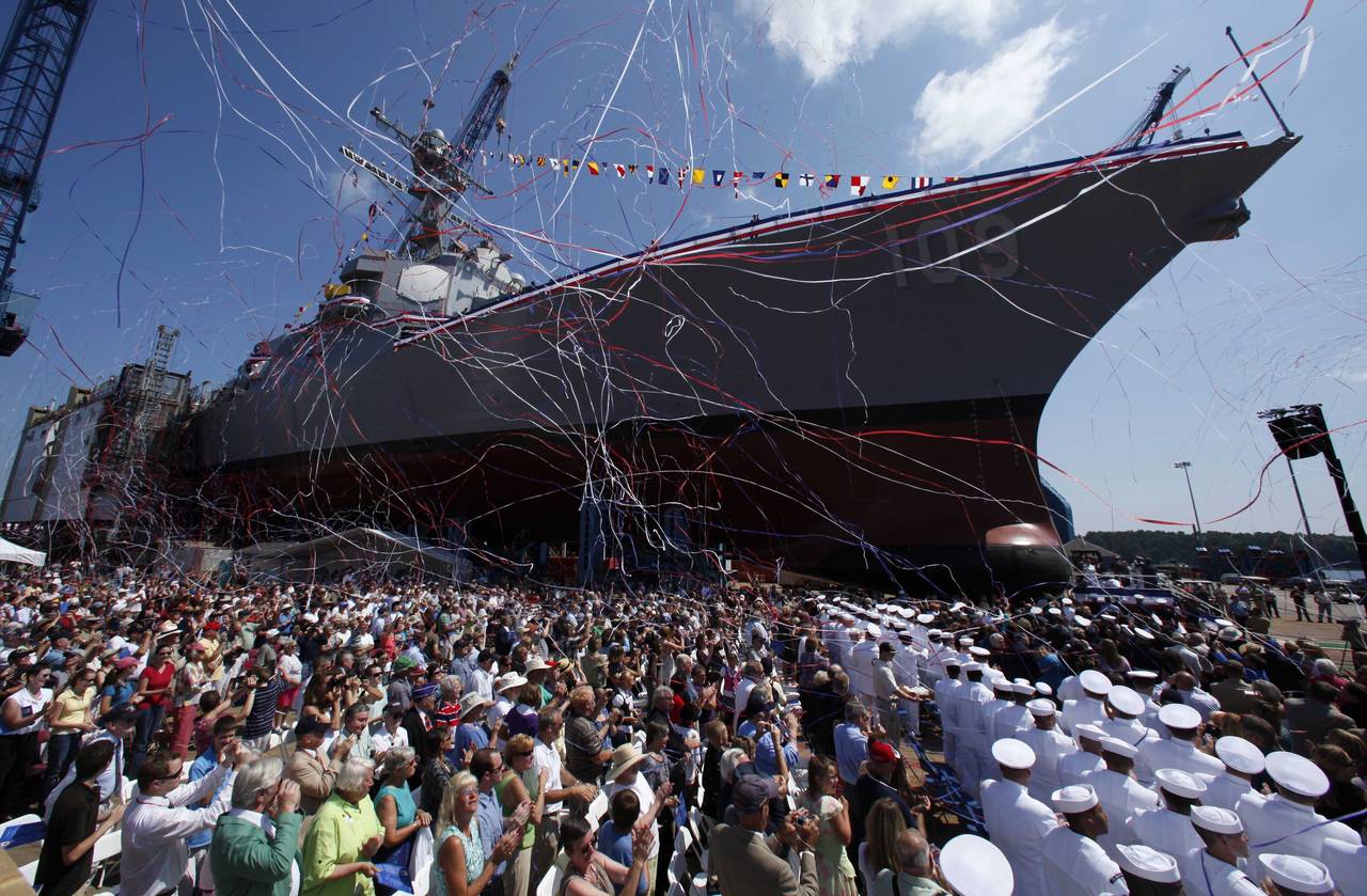 FILE - An Arleigh-Burke Class destroyer is christened at Bath Iron Works in Bath, Maine, Aug. 1, 20...