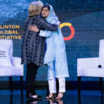 
              Malala Yousafzai greets Hillary Clinton at the Clinton Global Initiative, Tuesday, Sept. 20, 2022, in New York. (AP Photo/Julia Nikhinson)
            