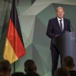 
              German Chancellor Olaf Scholz (SPD) speaks at the 2022 Bundeswehr Conference in Berlin, Friday, Sept. 16, 2022.  Germany is taking control of three Russian-owned refineries in the country to ensure energy security before an embargo on oil from Russia takes effect next year. The Economy Ministry said in a statement Friday that Rosneft Deutschland GmbH and RN Refining & Marketing GmbH will be put under the administration of Germany’s Federal Network Agency. (Carsten Koall/dpa via AP)
            