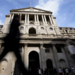 
              Pedestrians walk past The Bank of England in London, Thursday, Sept. 22, 2022. Britain's central bank is under pressure to make another big interest rate hike Thursday. Inflation in the United Kingdom is outpacing other major economies, but the U.S. Federal Reserve and other banks are moving faster to get prices under control. (AP Photo/Kirsty Wigglesworth)
            