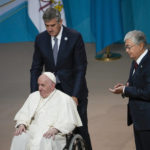 
              Kazakhstan's President Kassym-Jomart Tokayev, right, claps his hands to Pope Francis at the end of a meeting with authorities, civil society and diplomats at Qazaq Concert Hall in Nur-Sultan, Kazakhstan, Tuesday, Sept. 13, 2022. Pope Francis begins a 3-days visit to the majority-Muslim former Soviet republic to minister to its tiny Catholic community and participate in a Kazakh-sponsored conference of world religious leaders. (AP Photo/Alexander Zemlianichenko)
            