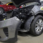 
              A Kia which was damaged after being stolen is seen at an auto repair shop in Milwaukee on Wednesday, Jan. 27, 2021.  Some Hyundai and Kia cars and SUVs are missing a key anti-theft device, and the crooks have figured it out. An insurance industry group says they're being stolen at a rate nearly double the rest of the auto industry because they don't have computer chips in the keys. (Angela Peterson//Milwaukee Journal-Sentinel via AP)
            