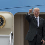 
              President Joe Biden gestures as he boards Air Force One Monday, Sept. 12, 2022, at Andrews Air Force Base, Md. (AP Photo/Gemunu Amarasinghe)
            