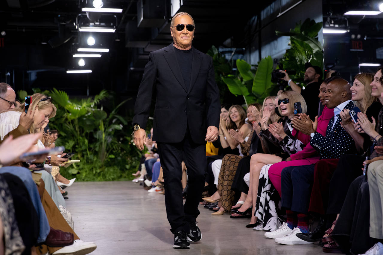 Michael Kors walks the runway at the conclusion of his fashion show during Fashion Week, Wednesday,...
