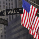 
              American flags fly outside the New York Stock Exchange, Friday, Sept. 23, 2022, in New York. Stocks tumbled worldwide Friday on more signs the global economy is weakening, just as central banks raise the pressure even more with additional interest rate hikes. (AP Photo/Mary Altaffer)
            