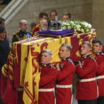 
              The coffin of Queen Elizabeth arrives at Westminster Hall in London, Wednesday, Sept. 14, 2022. The Queen will lie in state in Westminster Hall for four full days before her funeral on Monday Sept. 19. (AP Photo/Gregorio Borgia, Pool)
            