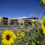 
              Homeless individuals sheltering at the former Quality Inn hotel on Zuni Street in Denver were told Friday, Sept. 16, 2022, that they had to move out. The Quality Inn in Denver, leased from the private owner by the Colorado Coalition for the Homeless, provided rooms for those over 65-years-old and people at greater risk for severe COVID-19 illness. The hotel rooms offered homeless people security, privacy, and stability. The programs, however, did spark a national trend of states and cities purchasing hotels to convert into permanent housing. (Eric Lutzens/The Denver Post via AP)
            