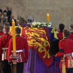 
              The coffin of Queen Elizabeth arrives at Westminster Hall in London, Wednesday, Sept. 14, 2022. The Queen will lie in state in Westminster Hall for four full days before her funeral on Monday Sept. 19. (AP Photo/Gregorio Borgia, Pool)
            