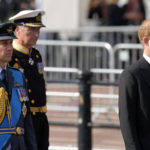 
              Britain's King Charles III, second left, Prince Harry, second right, and Prince William, left, follow the coffin of Queen Elizabeth II during a procession from Buckingham Palace to Westminster Hall in London, Wednesday, Sept. 14, 2022. The Queen will lie in state in Westminster Hall for four full days before her funeral on Monday Sept. 19. (AP Photo/Kirsty Wigglesworth)
            
