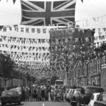 
              People gather to celebrate for Queen Elizabeth II Jubilee Day on Prothero Road, Fulham, in London, May 5, 1977. (AP Photo/Nancy Kaye)
            