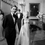 
              FILE - Prince Charles and Tricia Nixon, daughter of President Richard Nixon, lead the way to join guests at a White House formal supper-dance, July 17, 1970. Following are Princess Anne, left, and Julie, hidden, and Daivd Eisenhower. (AP Photo/RH, File)
            