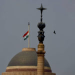 
              The Indian flag flies at half-mast at the Indian Presidential Palace following Thursday’s death of Britain's Queen Elizabeth II in New Delhi, India, Sunday, Sept.11, 2022. (AP Photo/Manish Swarup)
            