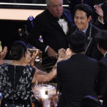 
              The cast of "Squid Games" congratulates their fellow cast mate, Lee Jung-jae, the winner of the Emmy for outstanding lead actor in a drama series for "Squid Game" at the 74th Primetime Emmy Awards on Monday, Sept. 12, 2022, at the Microsoft Theater in Los Angeles. (AP Photo/Mark Terrill)
            