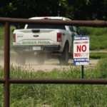 
              A Border Patrol vehicle enters Heavenly Farms, a pecan farm owned by Hugo and Magali Urbina, Friday, Aug. 26, 2022, in Eagle Pass, Texas. The area has become entangled in a turf war between the Biden administration and Texas Gov. Greg Abbott over how to police the U.S. border with Mexico. (AP Photo/Eric Gay)
            