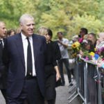 
              Britain's Prince Andrew and other members of the Royal family speak to well-wishers, following the death of Queen Elizabeth II on Thursday, at Balmoral, Scotland, Saturday, Sept. 10, 2022. (Owen Humphreys/Pool Photo via AP)
            