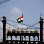 
              The Indian flag flies at half-mast at the historic Red Fort following Thursday’s death of Britain's Queen Elizabeth II in New Delhi, India, Sunday, Sept.11, 2022. (AP Photo/Manish Swarup)
            