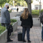 
              Thomas Caldwell of Berryville, Va., a defendant charged with seditious conspiracy in one of the most serious cases to emerge from the Jan. 6, 2021 attack on the U.S. Capitol, stands in line as he arrives outside the federal courthouse on the third day of jury selection, Thursday, Sept. 29, 2022, in Washington. (AP Photo/Manuel Balce Ceneta)
            