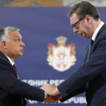 
              Hungary's Prime Minister Viktor Orban, left, shakes hands with Serbian President Aleksandar Vucic in Belgrade, Serbia, Friday, Sept. 16, 2022. Orban is on a one day working visit to Serbia. (AP Photo/Darko Vojinovic)
            